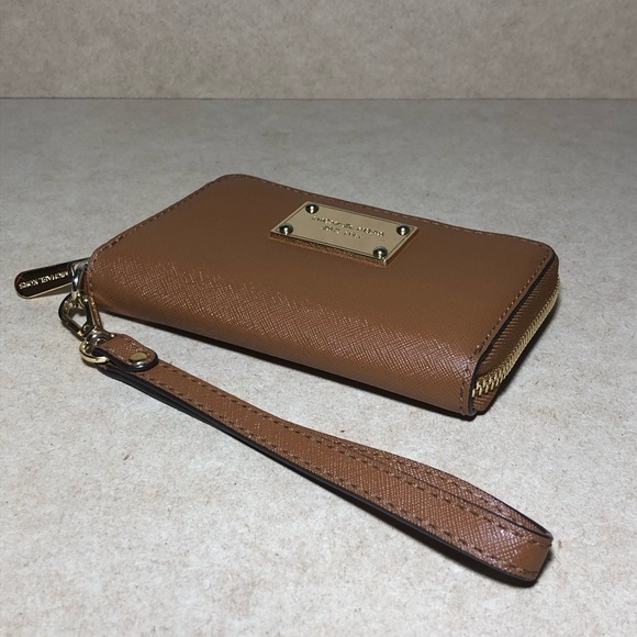 9. Michael Kors Cognac Zip Around Wristlet - Picture 6 of 14